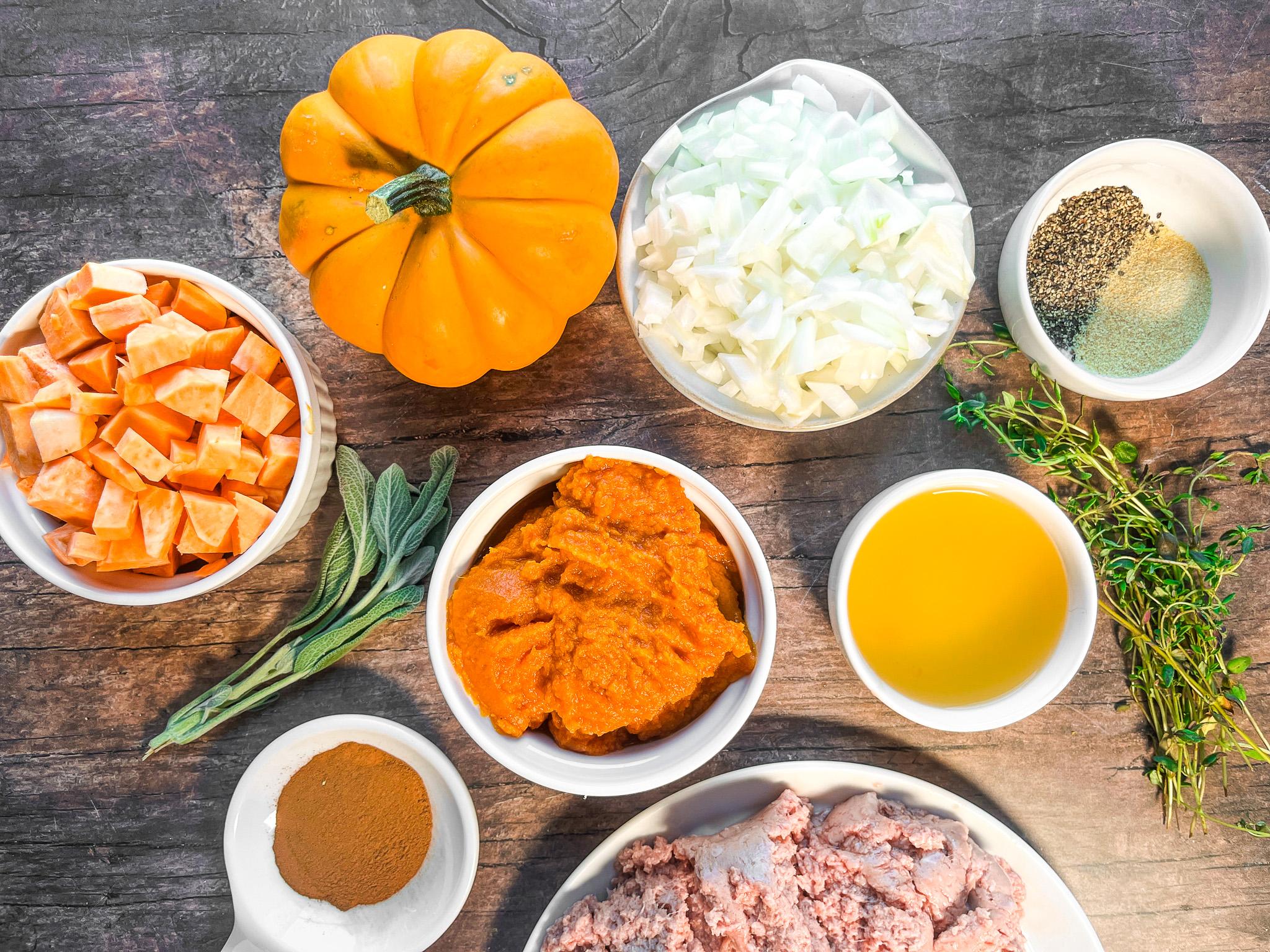 overhead shot of ingredients for a paleo bowl laid out on a wooden countertop