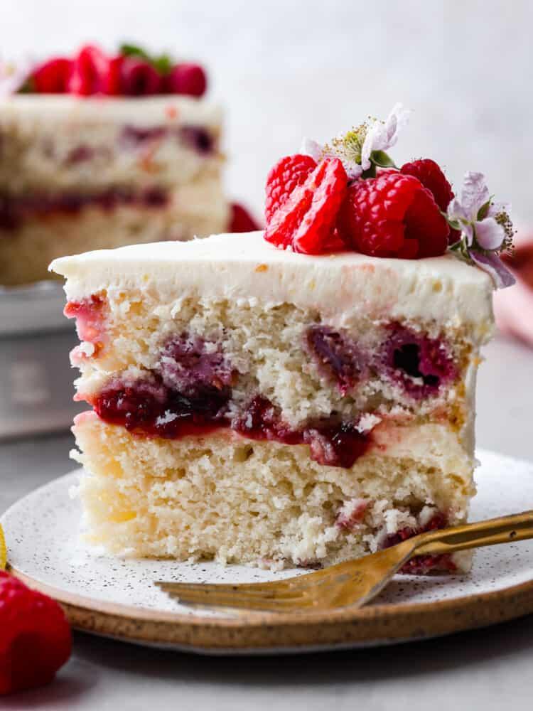 Close-up shot of a slice of Lemon Raspberry Burst Cake
