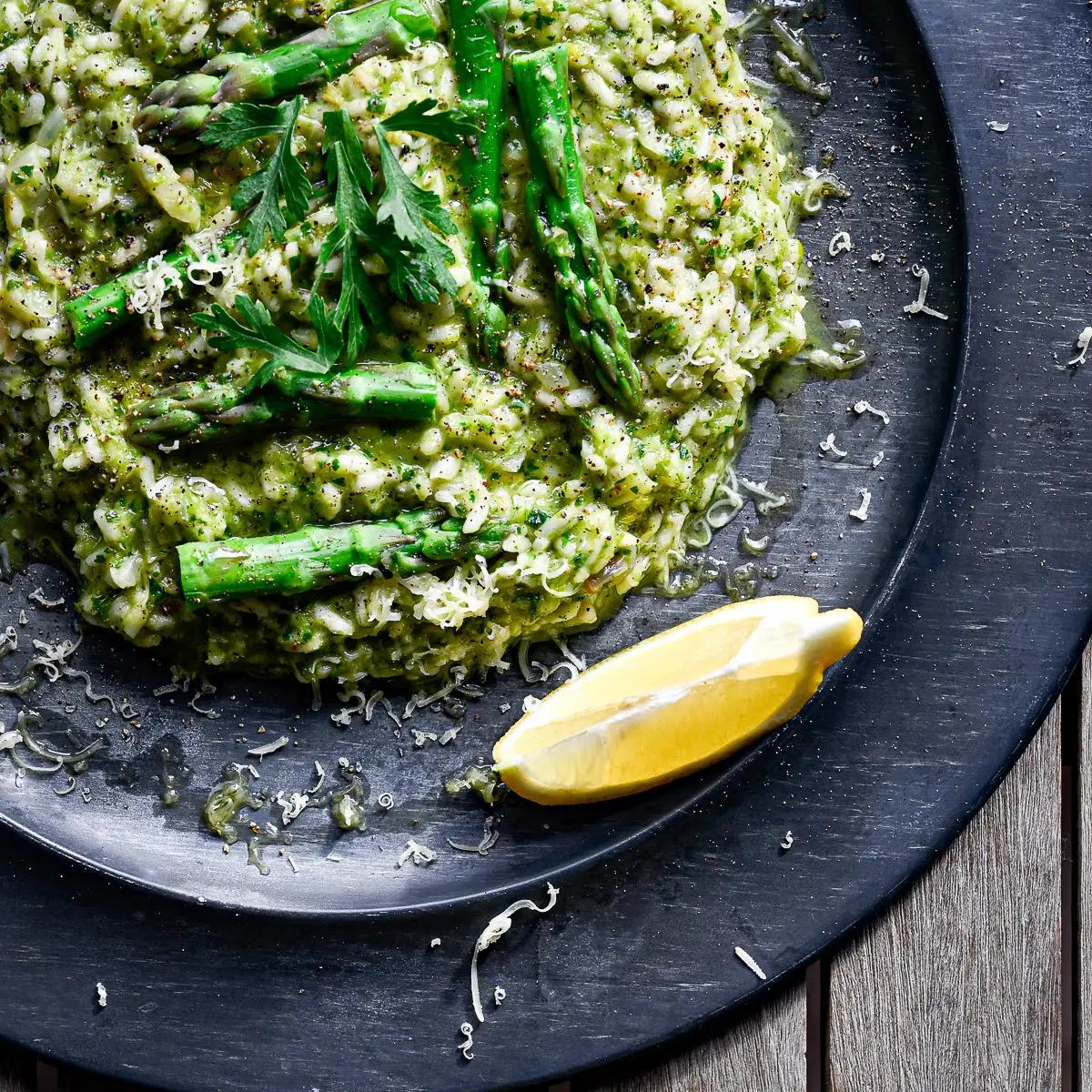 close-up of spicy asparagus risotto being stirred in a pan