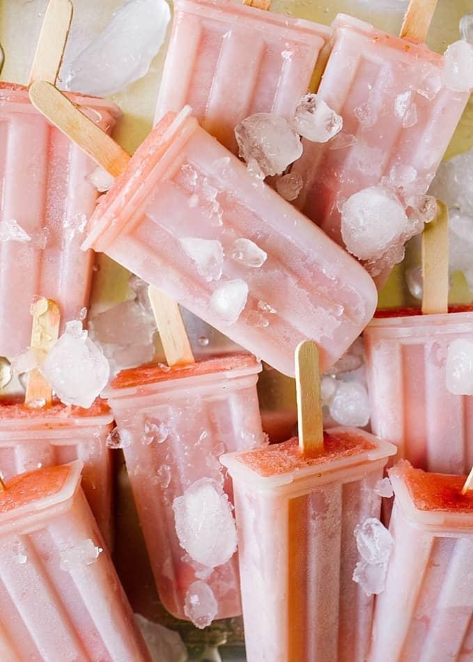 Rosé popsicles in various stages of preparation and enjoyment