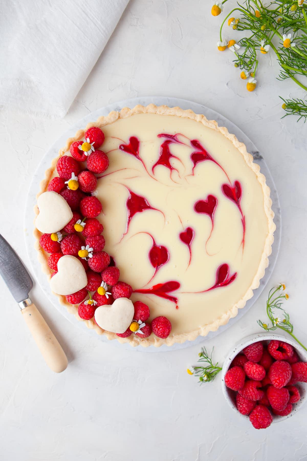 overhead shot of raspberry cake on a table