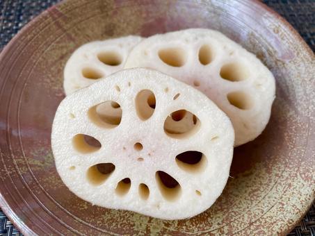 close-up shot of sliced lotus root showing its unique pattern