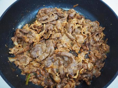 Close-up of bulgogi being cooked in a pan