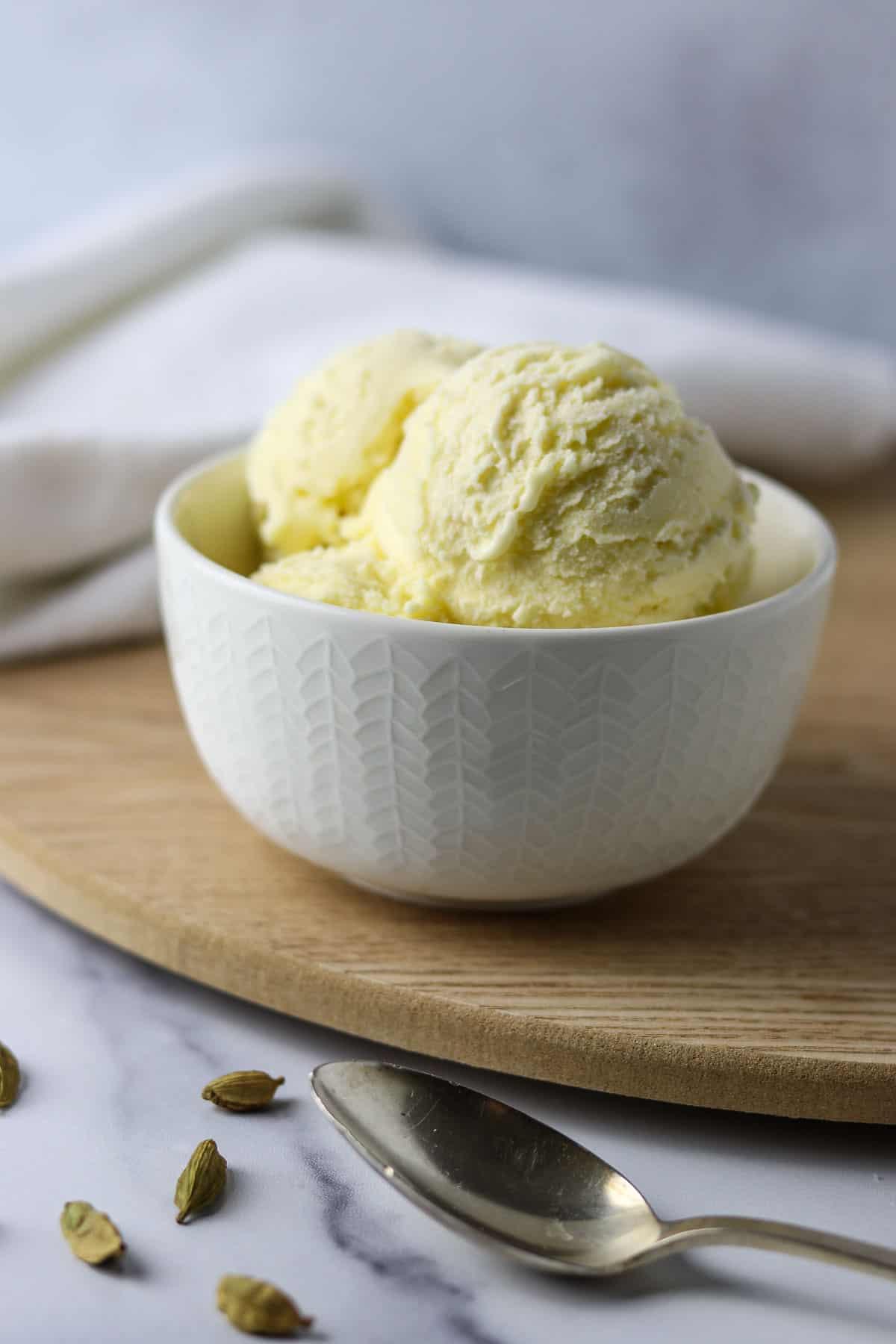A person enjoying a scoop of cardamom ice cream