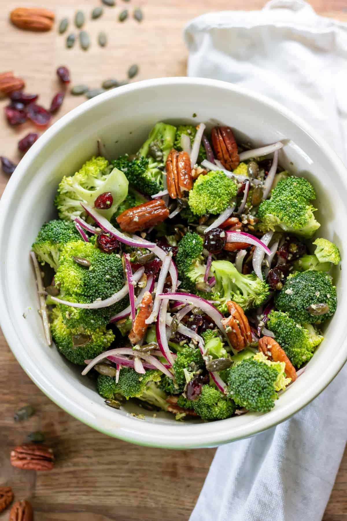 bowl of broccoli cranberry salad on a table