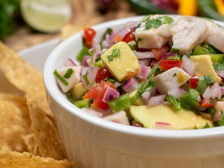 close up shot of a spoonful of green apple jalapeno mahi-mahi ceviche