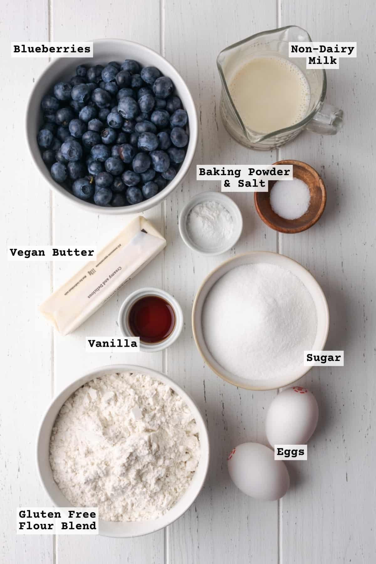 Ingredients for blueberry buckle on a wooden table