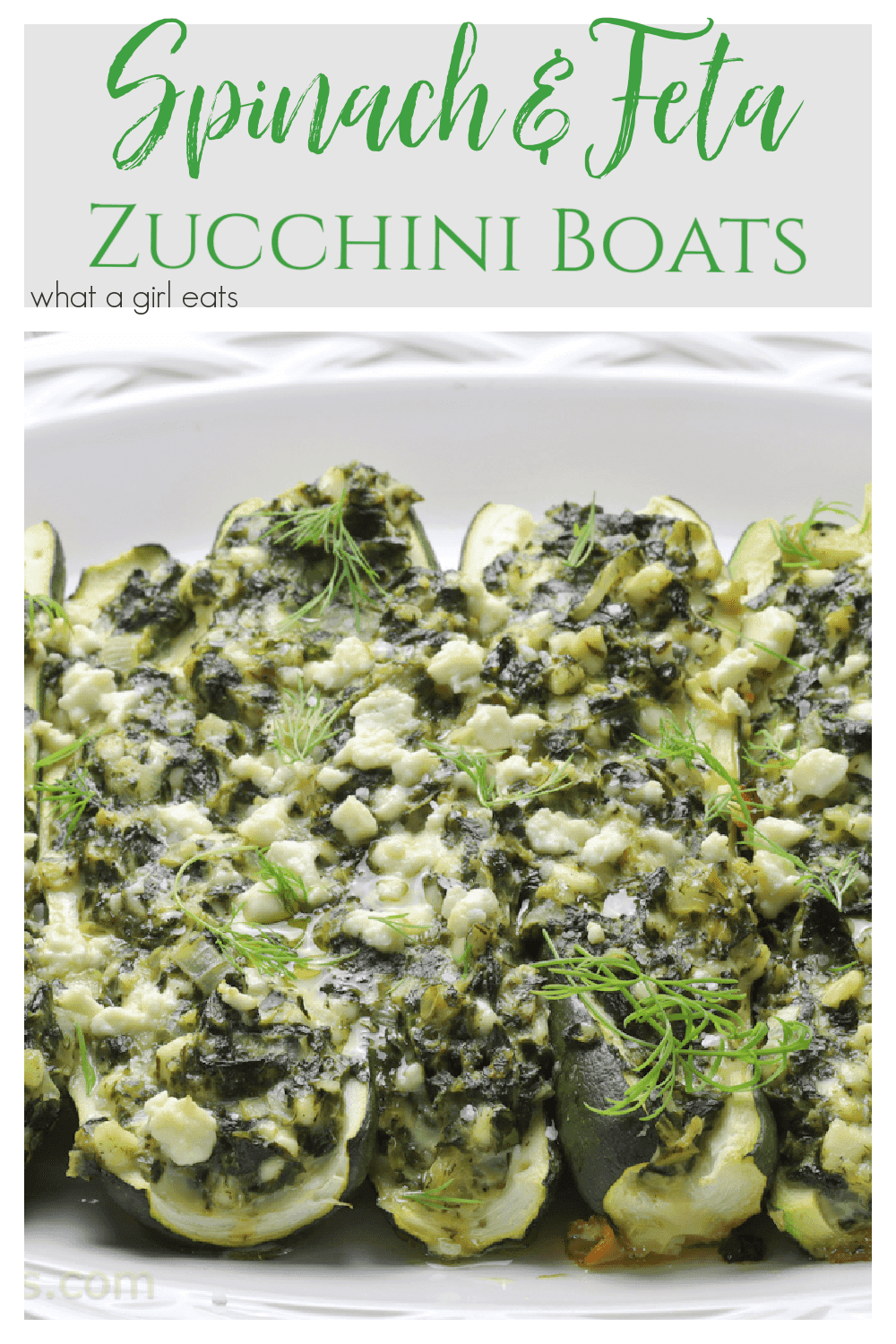 Overhead view of Spanakopita Stuffed Zucchini Boats arranged on a serving platter
