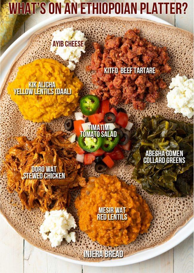 Ingredients laid out on a wooden table for making Injera and Beso Bela.