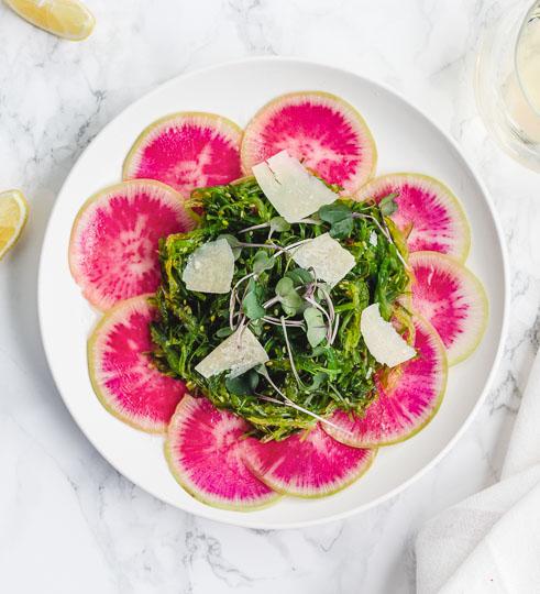 Radish and watermelon ceviche served on a colorful platter