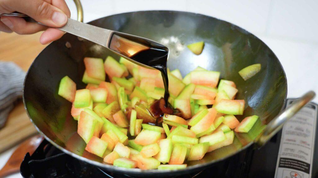Close-up shot of Xigua (Watermelon) Rind and Mint Frittata in a frying pan