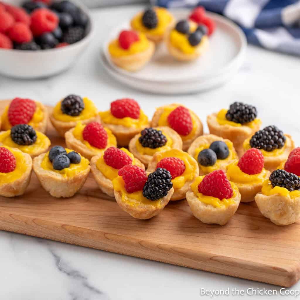 several citrus burst tartlets served at a party