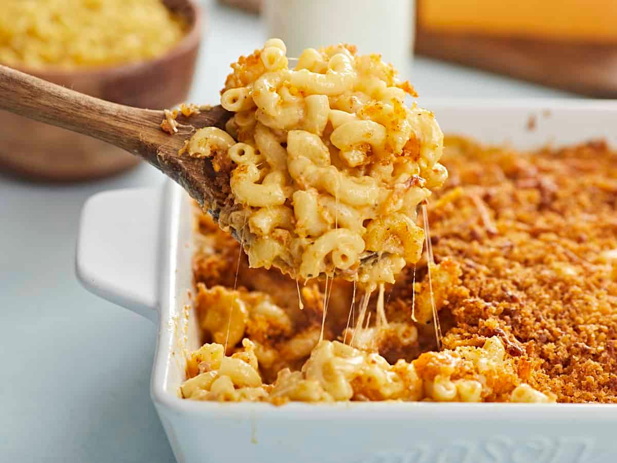 side view of mac and cheese pasta bake showing layers of pasta and cheese