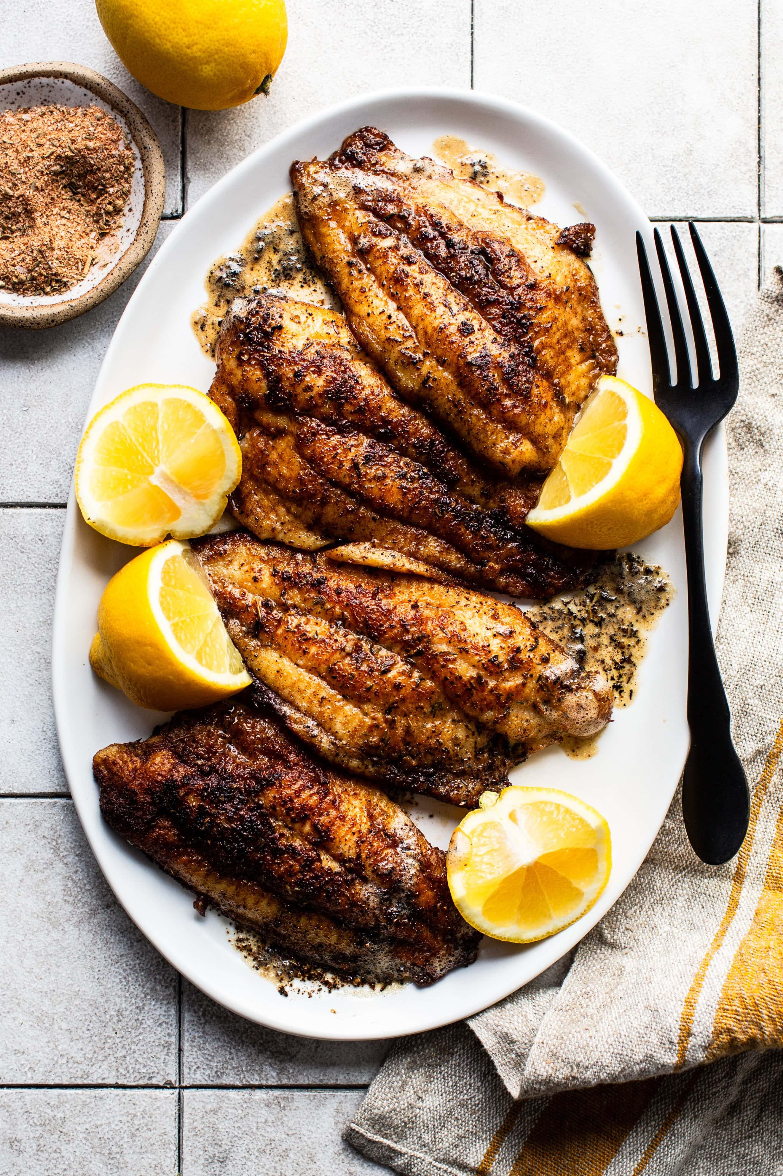 pan frying blackened catfish in cast iron skillet