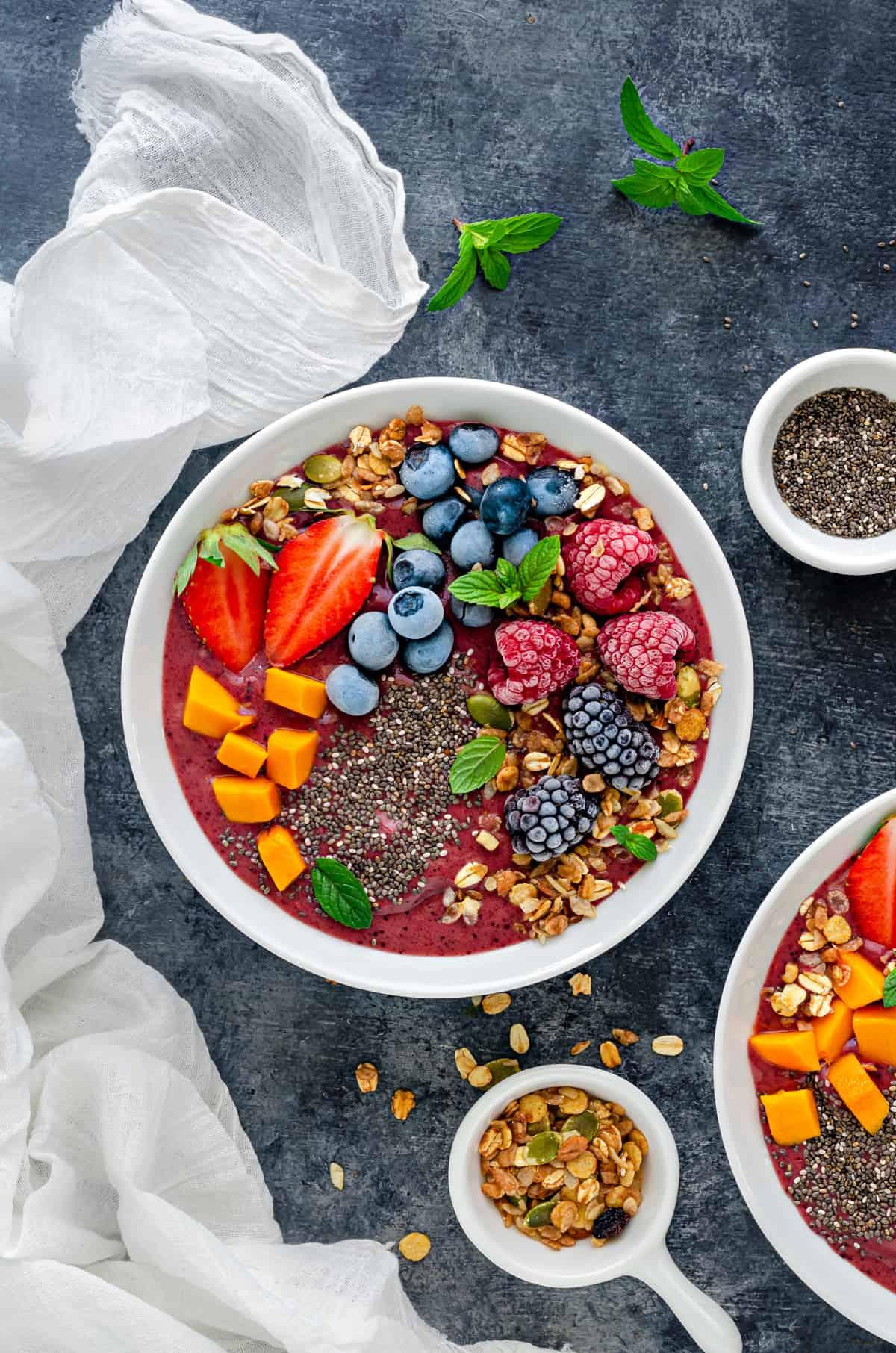 Overhead shot of a colorful hemp seed bowl with various toppings