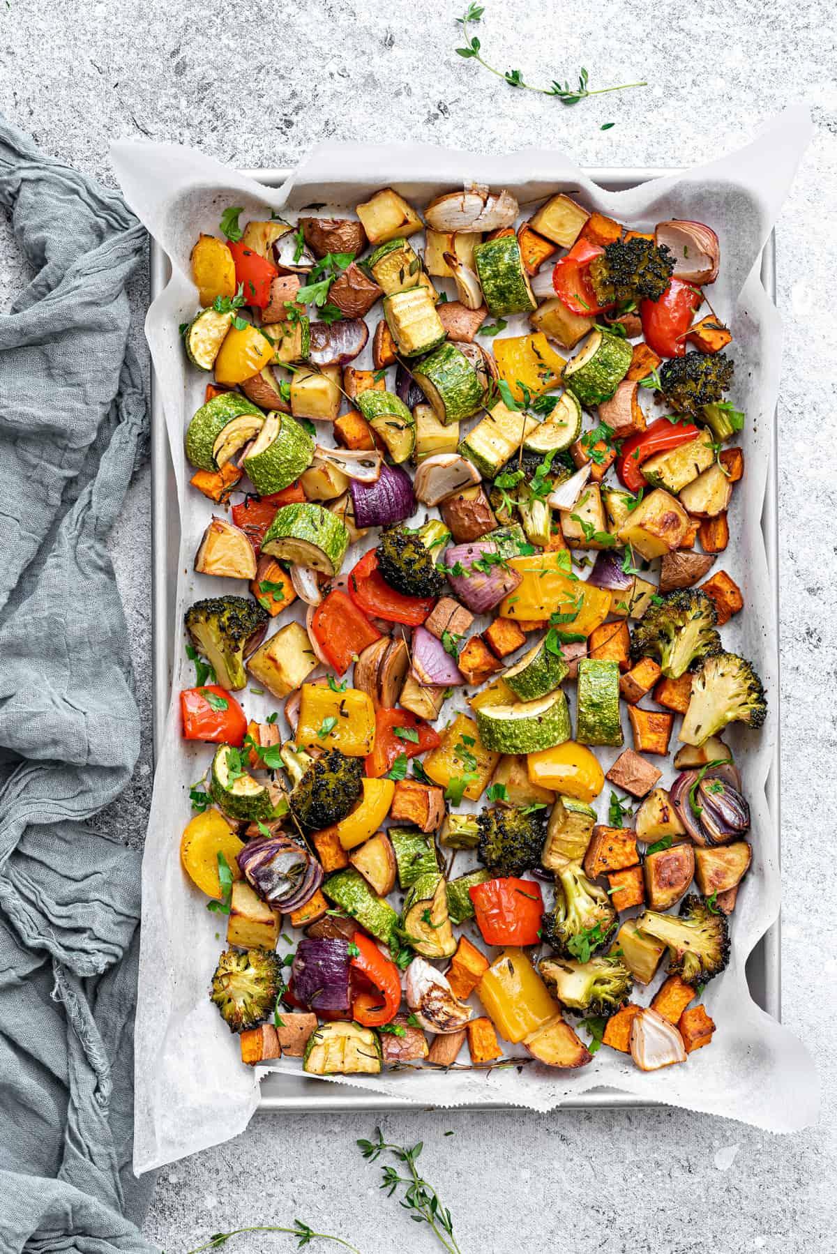 vibrant roasted vegetables on a baking sheet