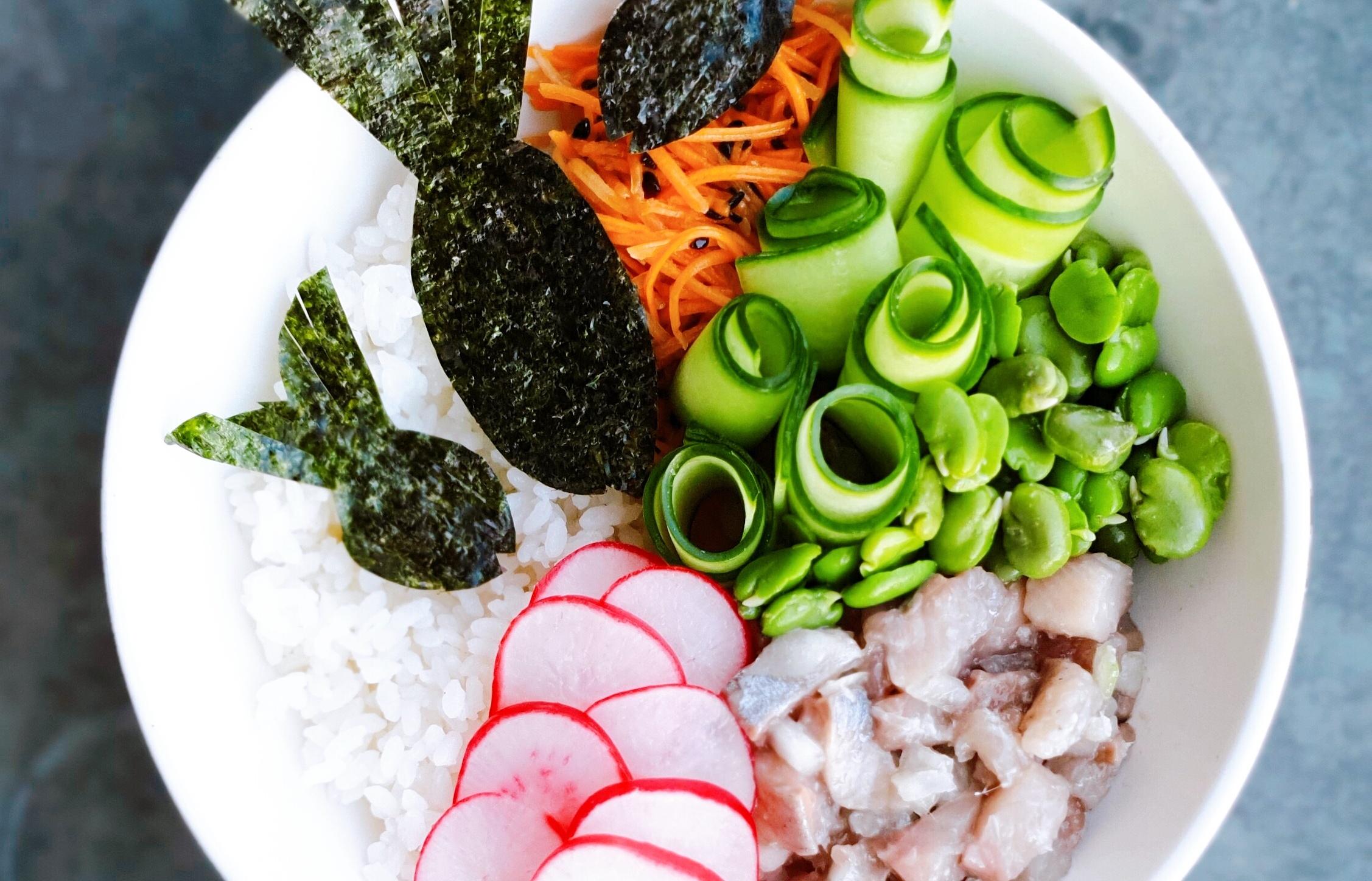 close up of ingredients for herring poke bowl