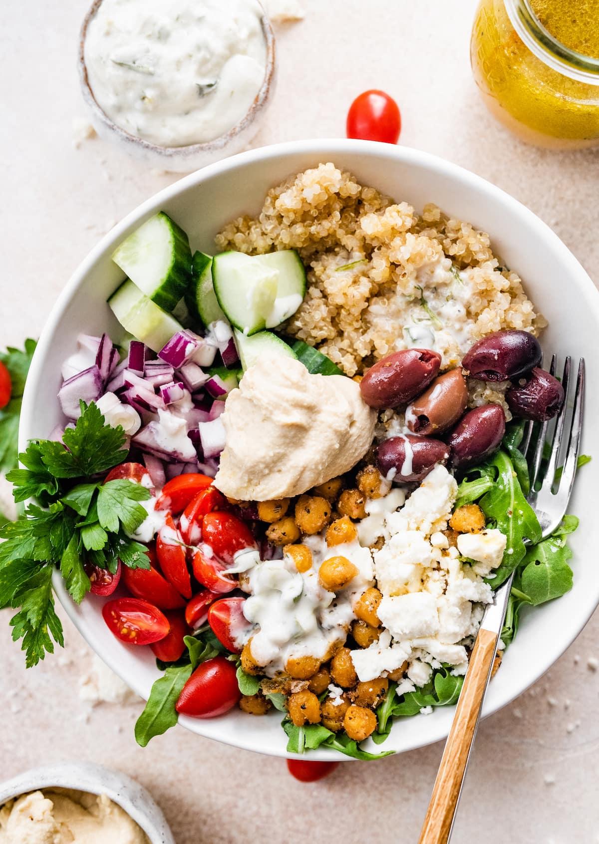 mediterranean quinoa bowl with cucumber, tomatoes, olives, and feta cheese