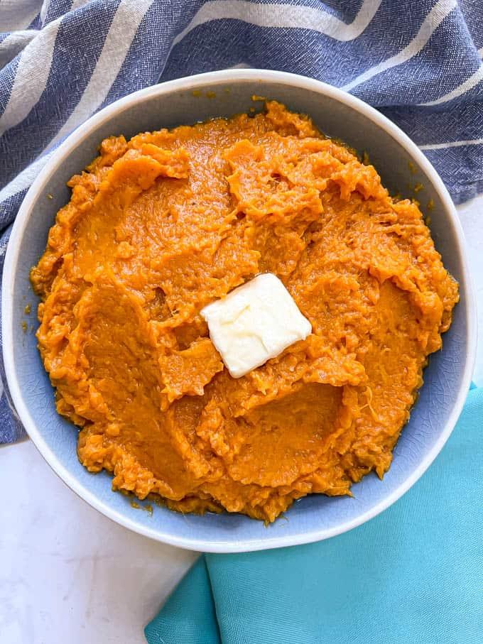 close-up of creamy mashed sweet potatoes in a bowl