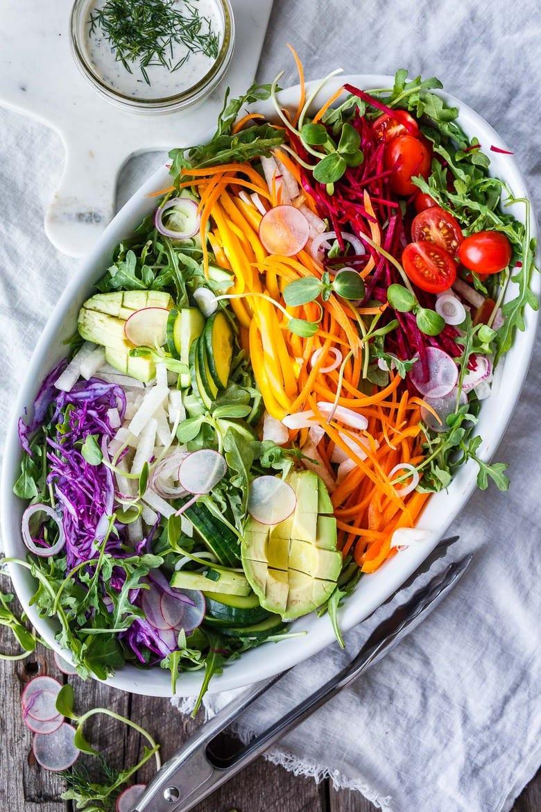 A colorful summer salad with fresh vegetables and a light dressing