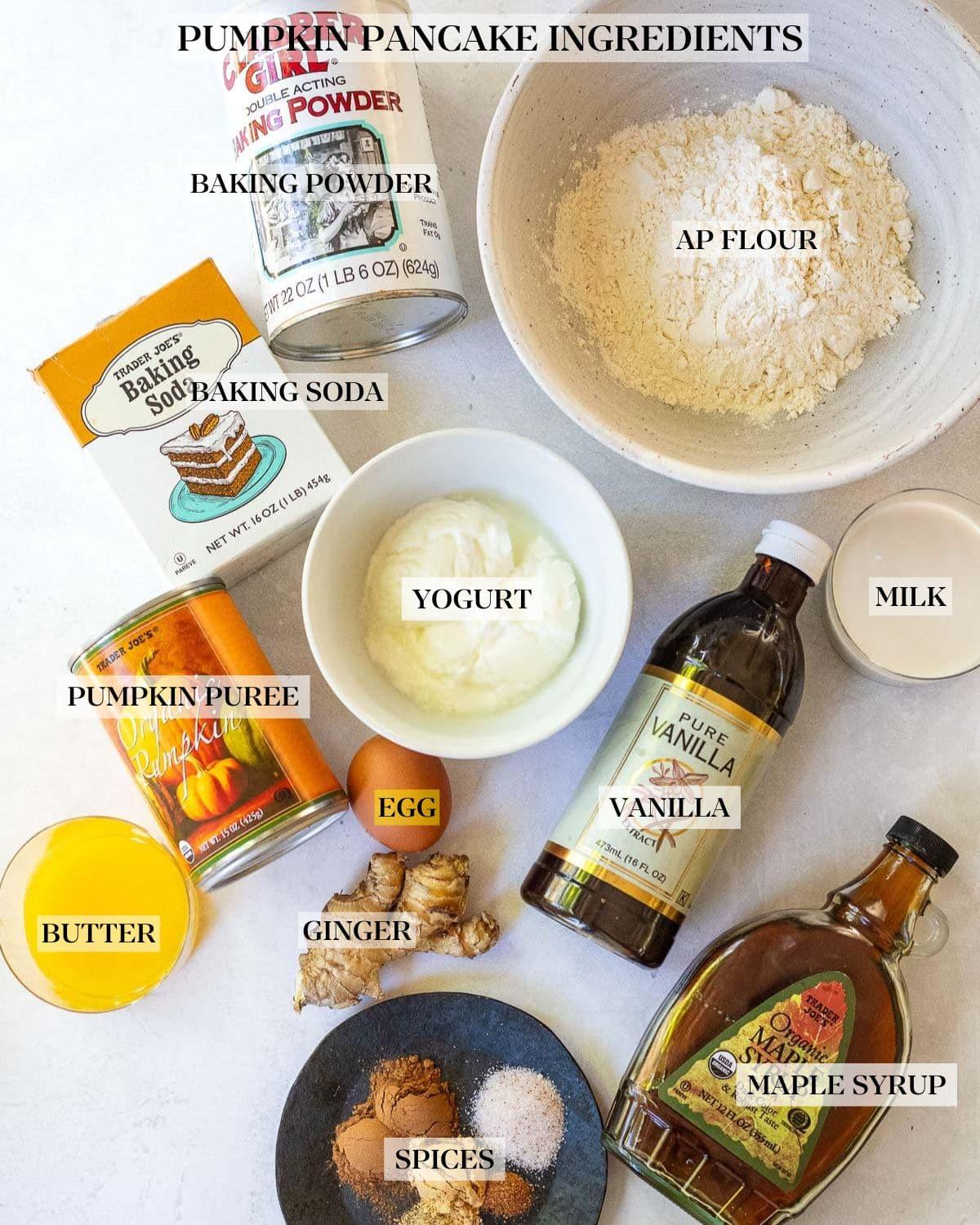 ingredients for paleo pancakes laid out on a wooden table