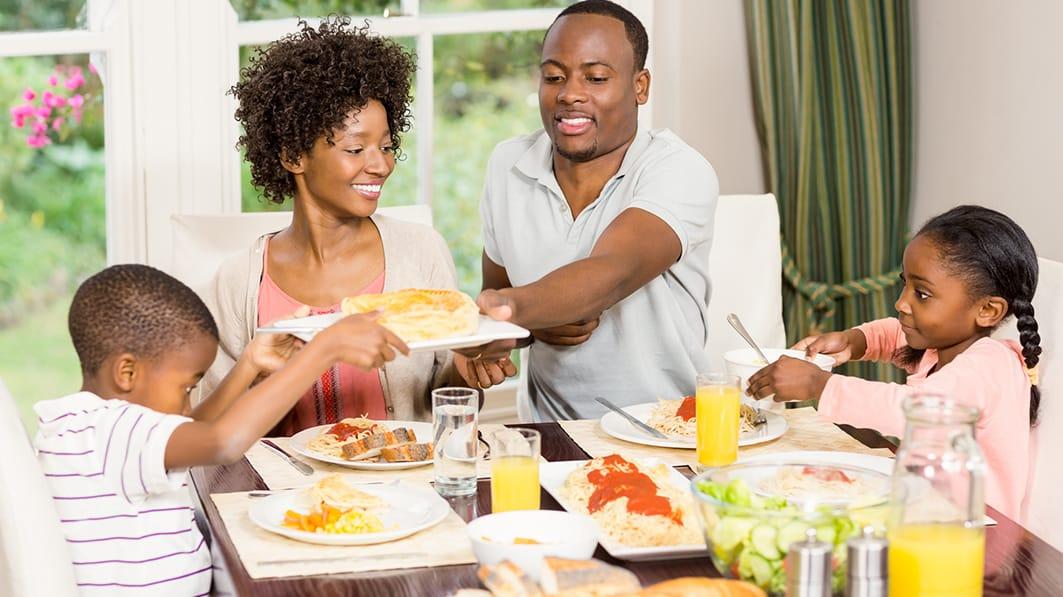 family enjoying dinner together