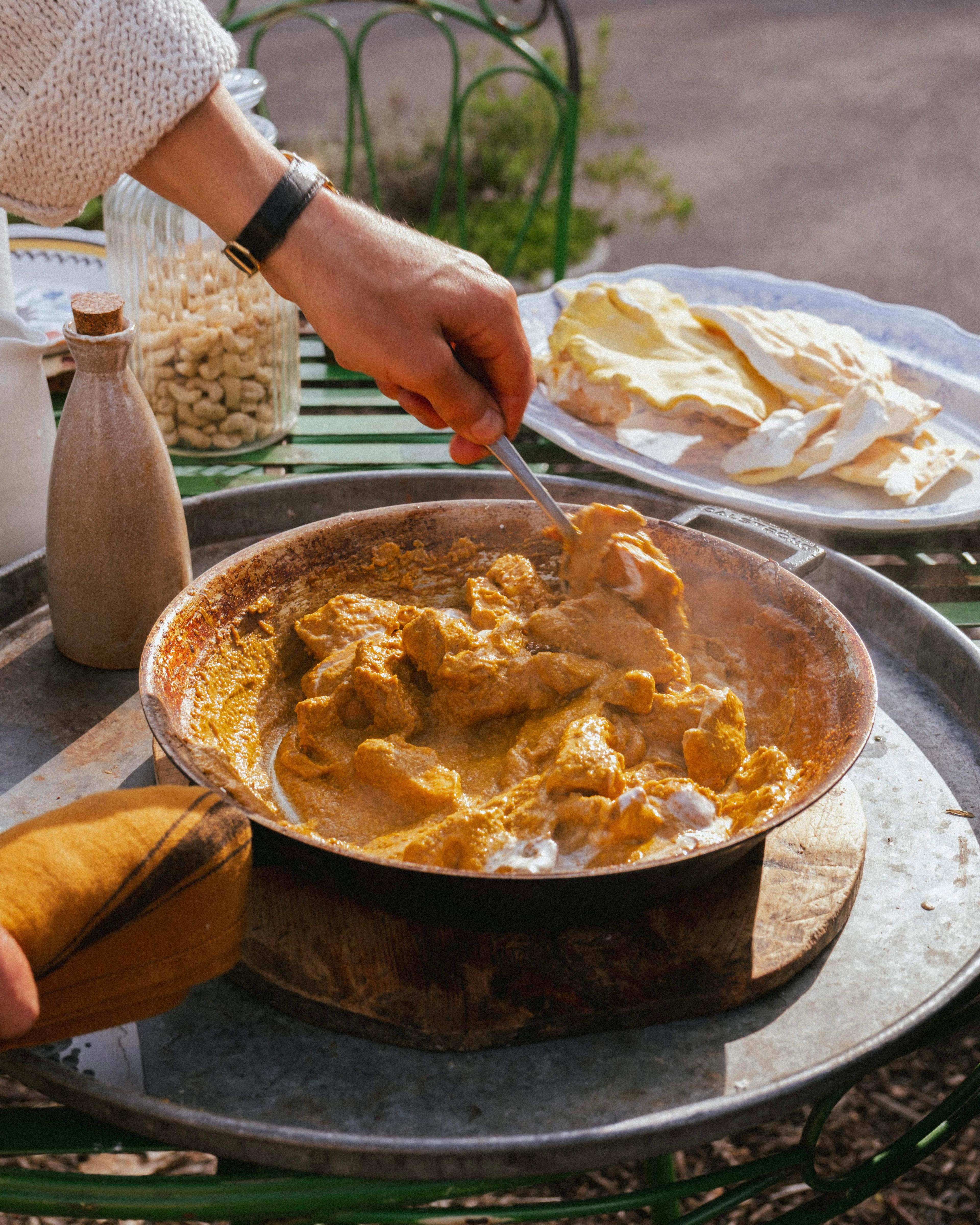 ingredients for moonlight butter chicken arranged on a wooden surface