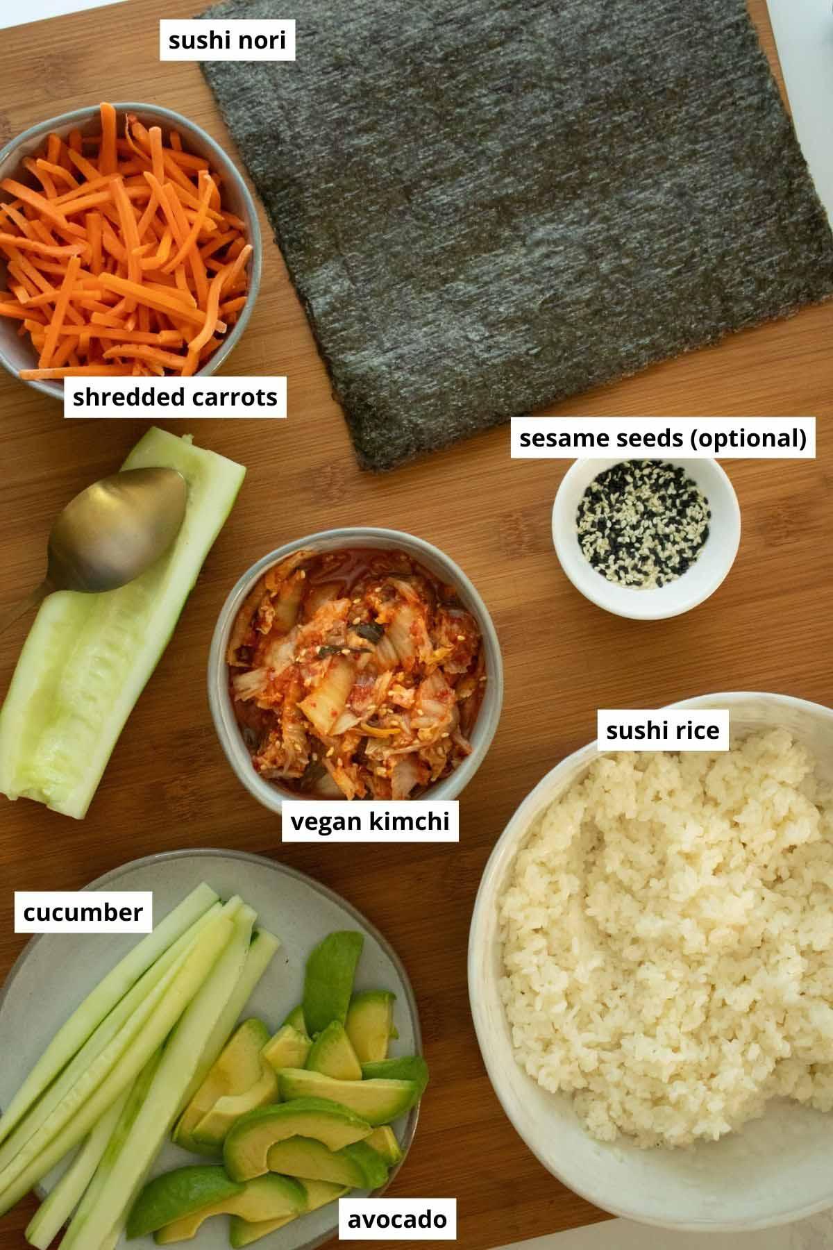 ingredients for kimchi chili arranged on a wooden table