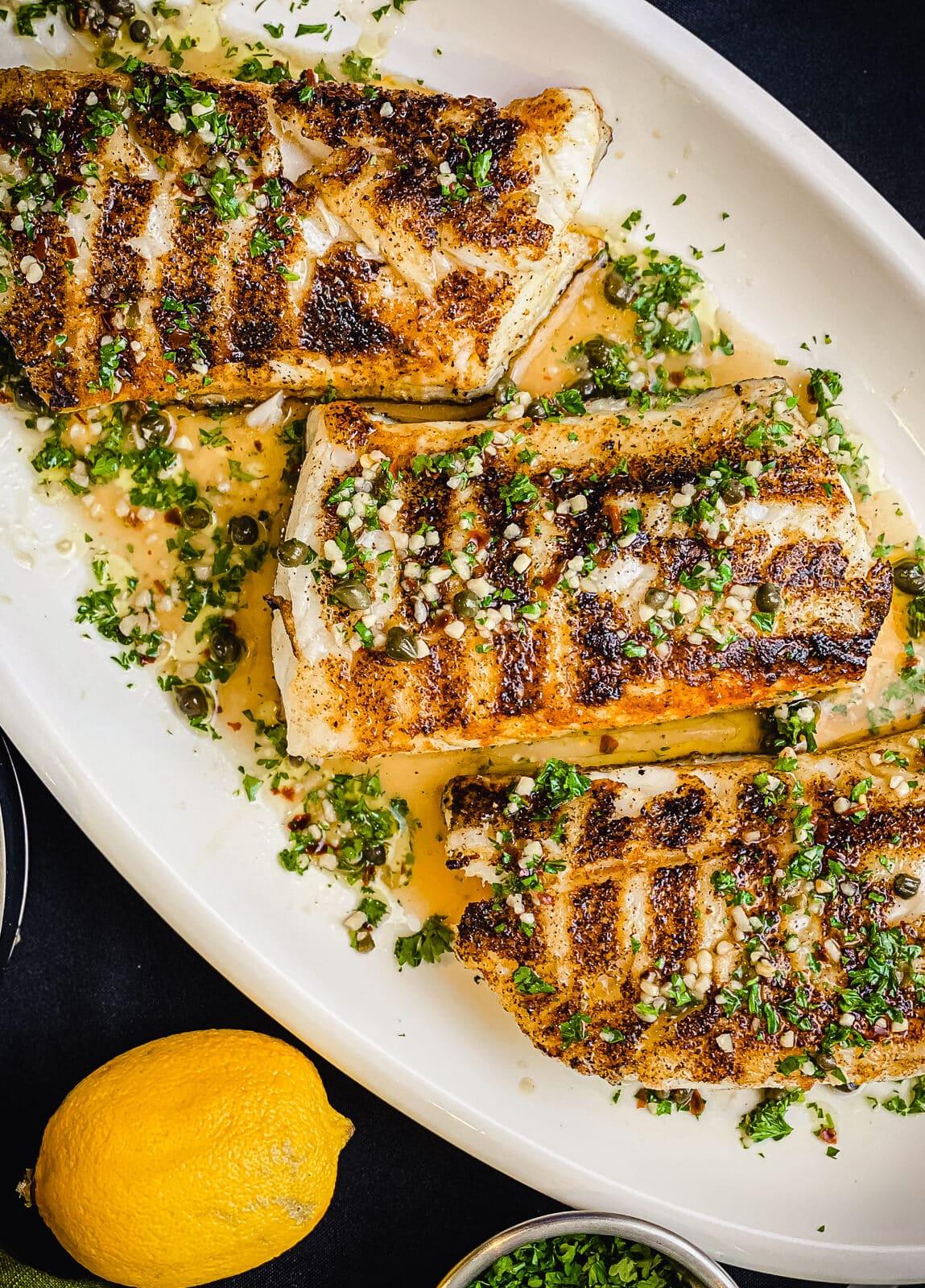 grilled Chilean sea bass drizzled with truffle oil