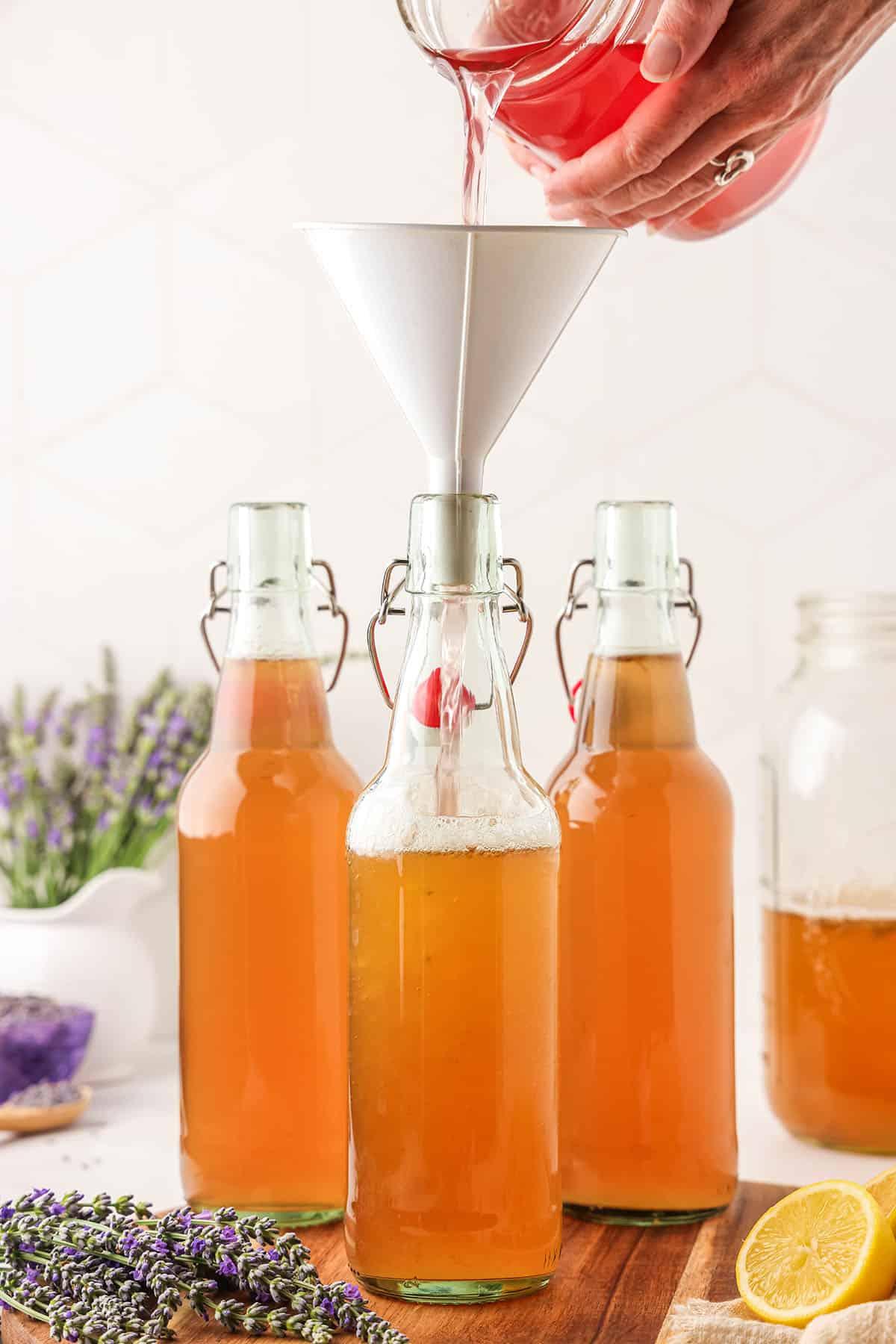 homemade lavender cranberry kombucha in glass bottles