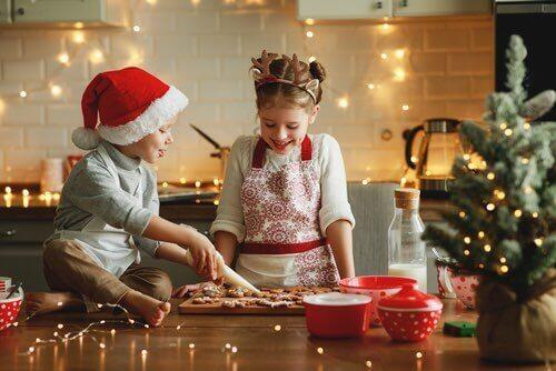 grandma and child decorating sprinkle sugar cookies in a warm kitchen