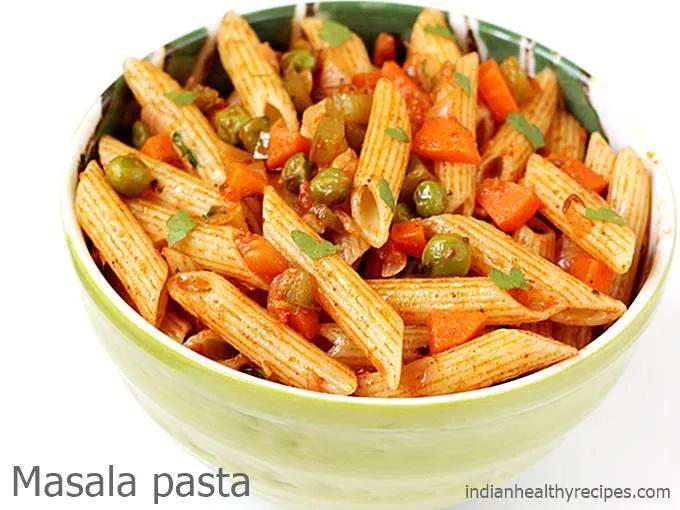 various herbs and spices added to pasta dish