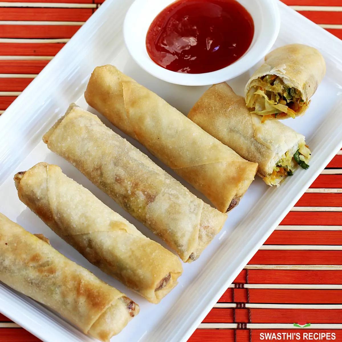 Person rolling spring rolls