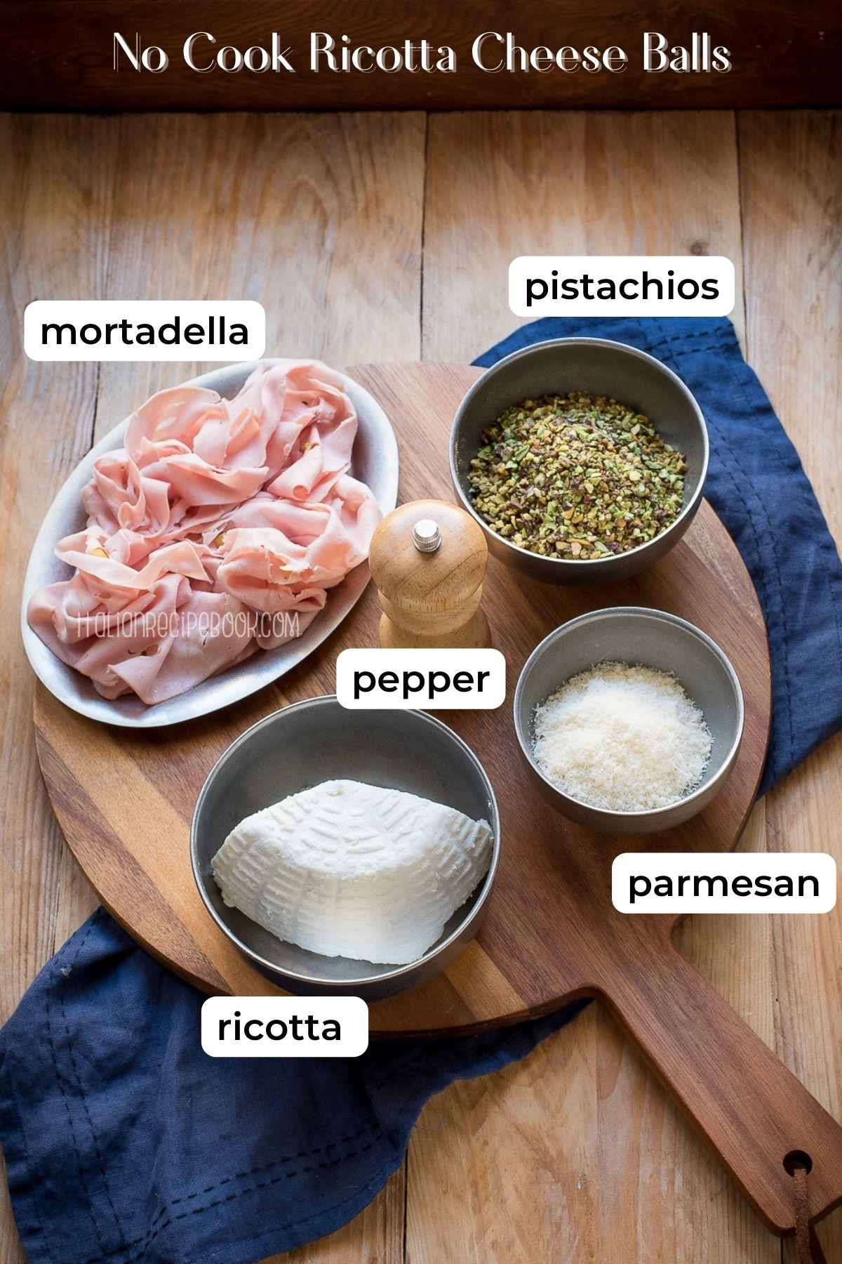 Ingredients laid out for Callaloo and Ricotta Cheese Ball, including callaloo, ricotta, Parmesan, and spices.