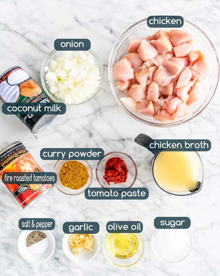 overhead shot of ingredients for coconut curry chicken burrito laid out on a table