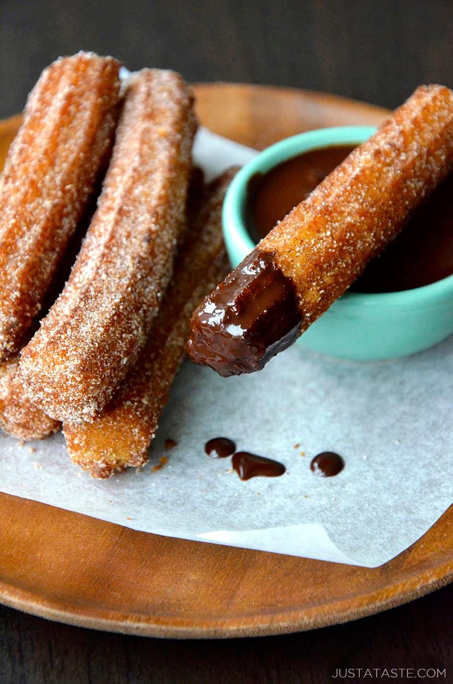 delicious churros with chocolate dipping sauce