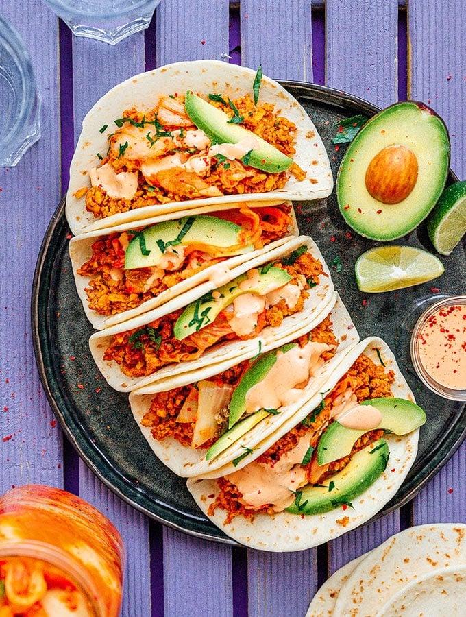 Finished kimchi empanada tacos being enjoyed