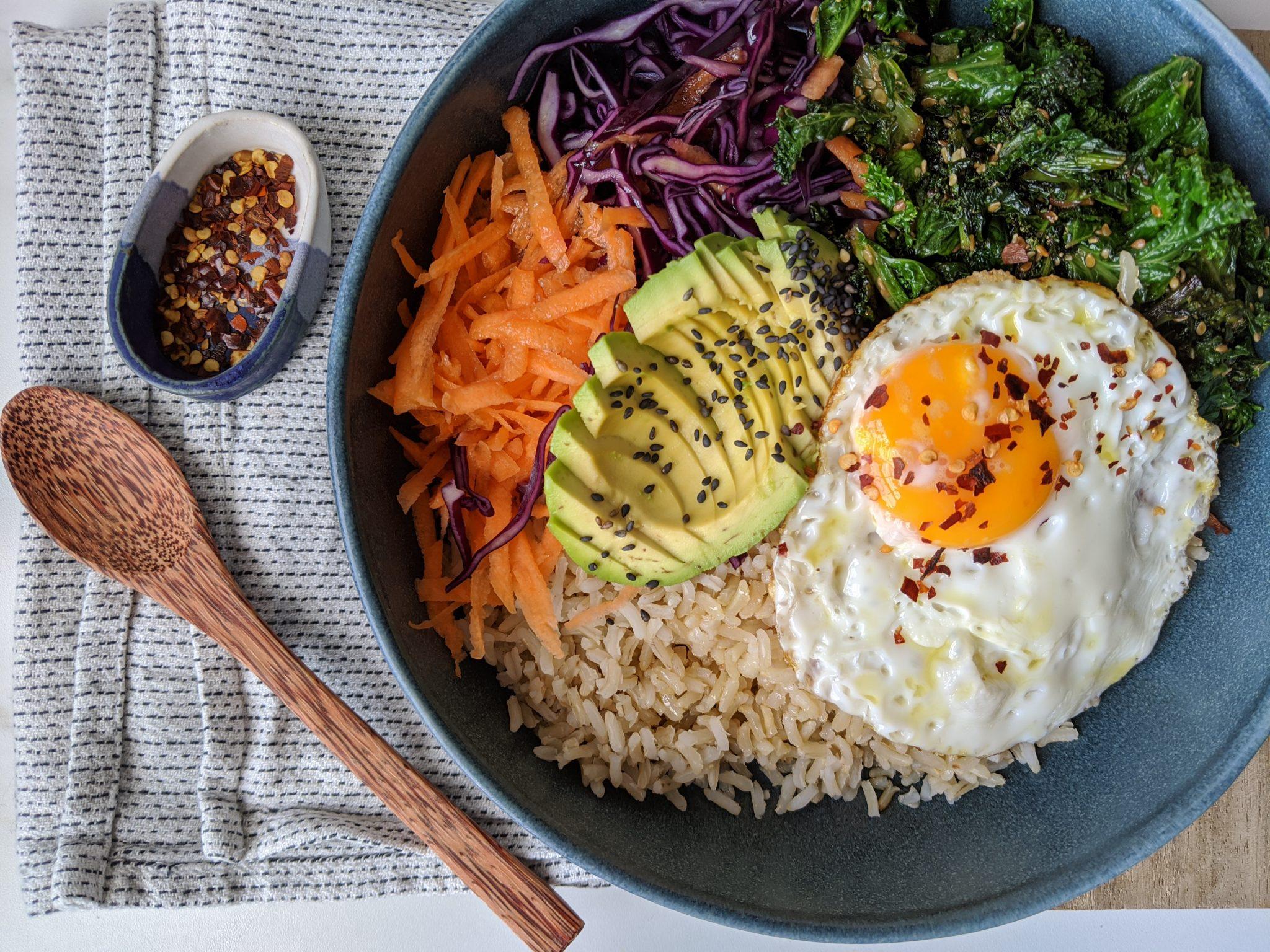 variety of gluten free rice bowls with colorful toppings for graduation party