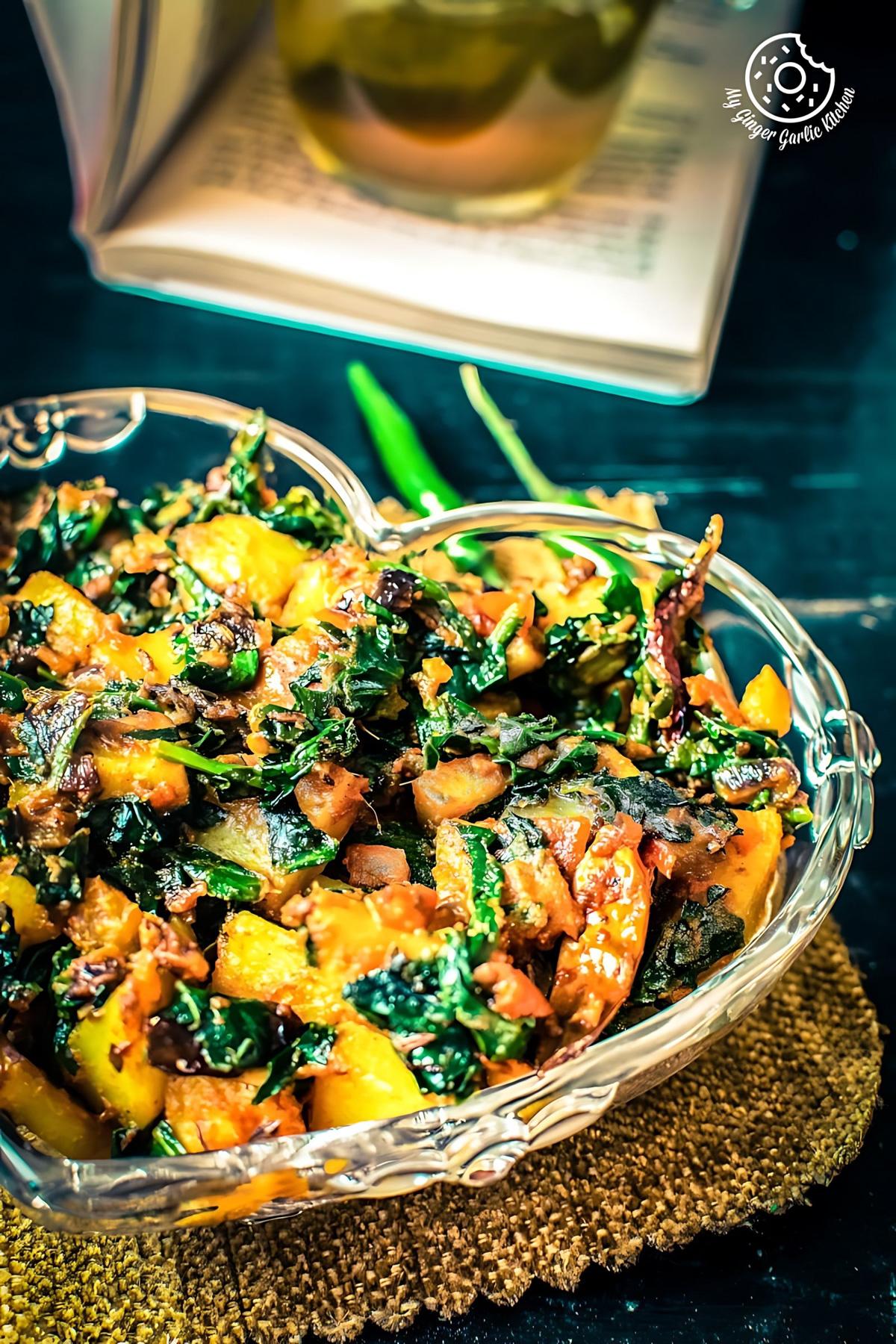 Chef preparing Aloo Palak Pizza with fresh ingredients