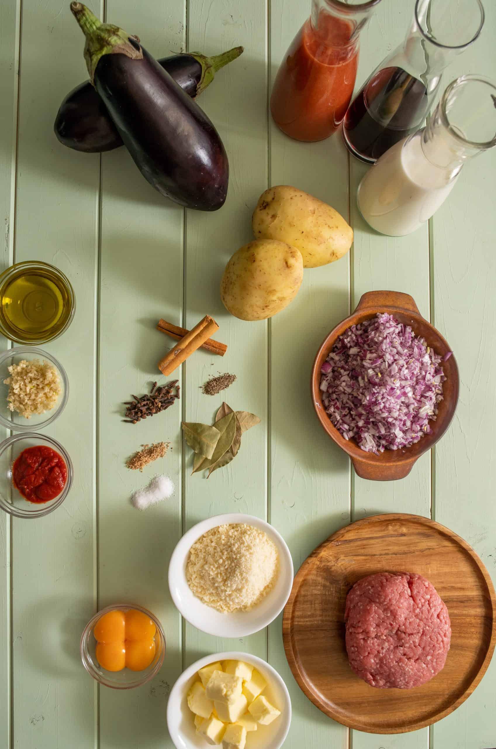 Moussaka Grilled Cheese ingredients laid out on a table