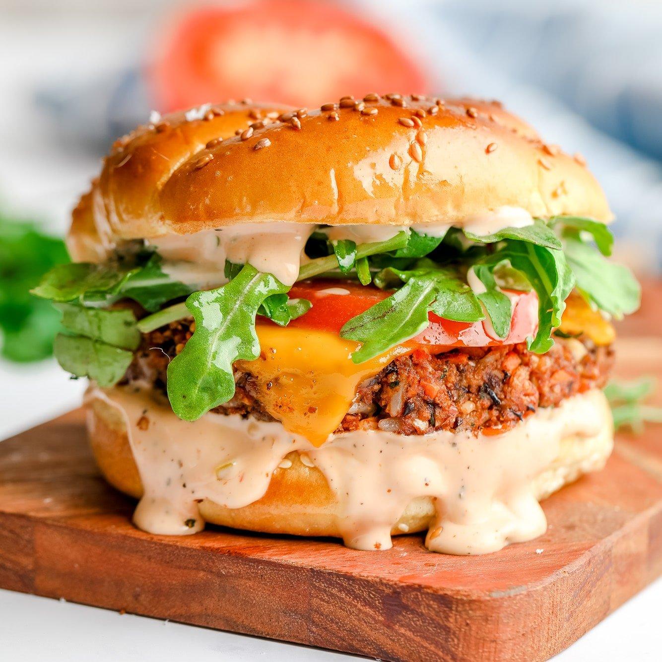 delicious vegan burger on a bun with toppings