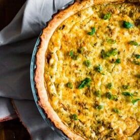 Ingredients for turnip and bacon quiche on a wooden countertop