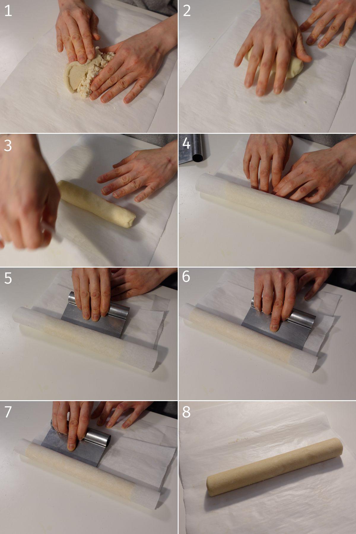 Hands gently pressing espresso shortbread dough into a log shape on parchment paper
