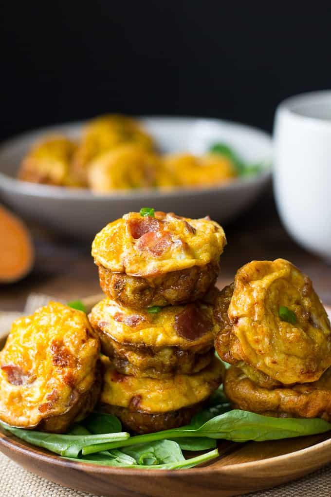 A family enjoying a breakfast of paleo bacon and egg muffins