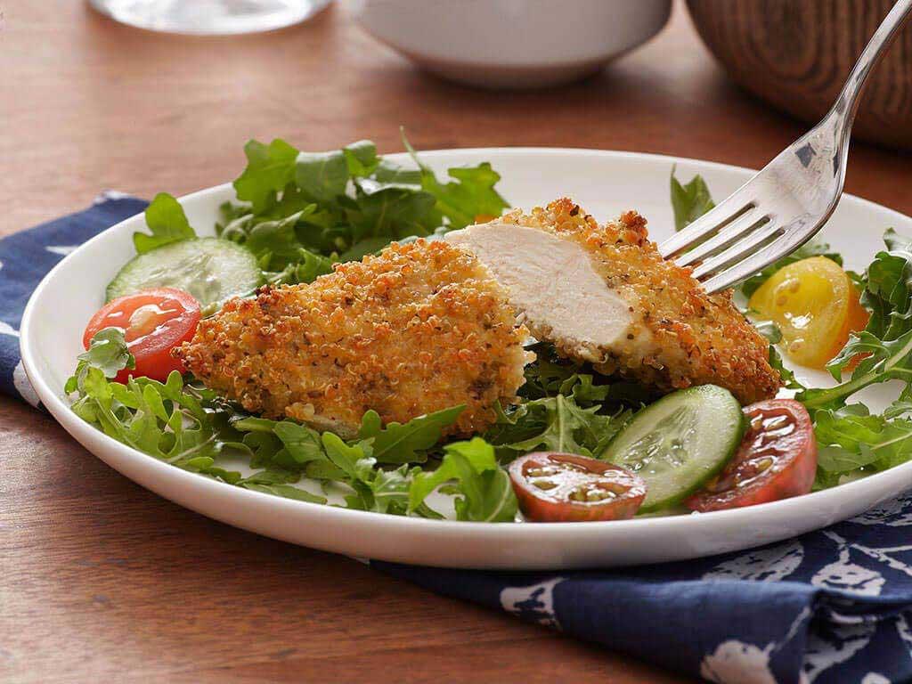 Plate of quinoa crusted fried chicken with sides