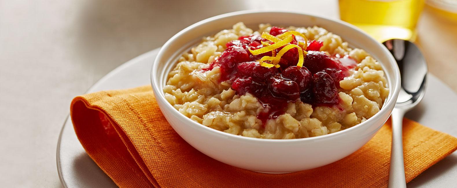 bowl of cranberry orange oatmeal with walnuts