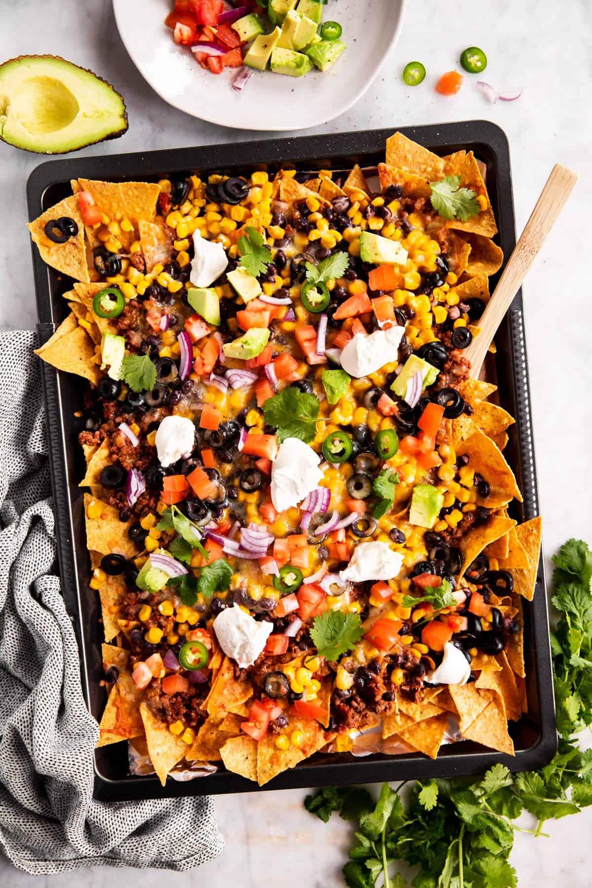 loaded game day nachos with dill sauce