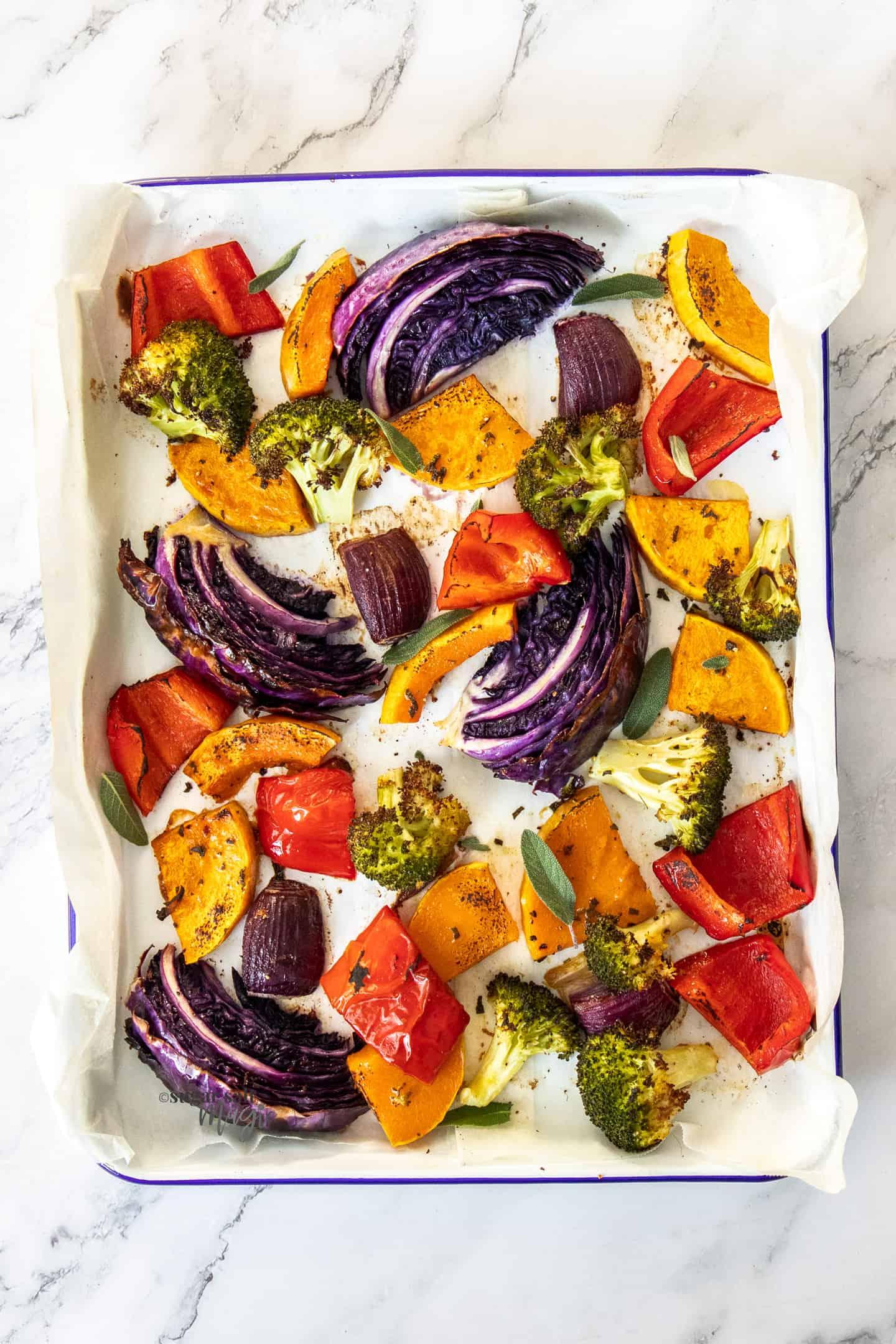 vibrant rainbow of roasted root vegetables on a platter