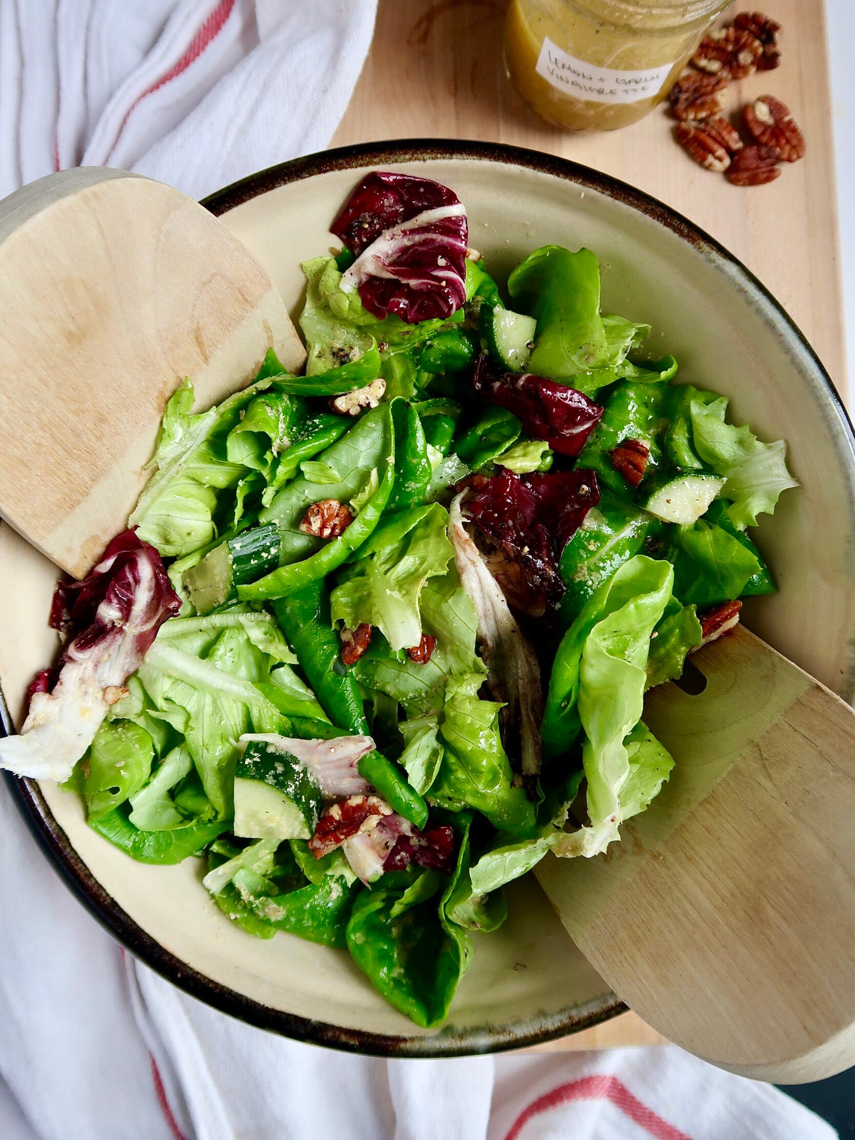 fresh salad drizzled with rosemary lemon vinaigrette