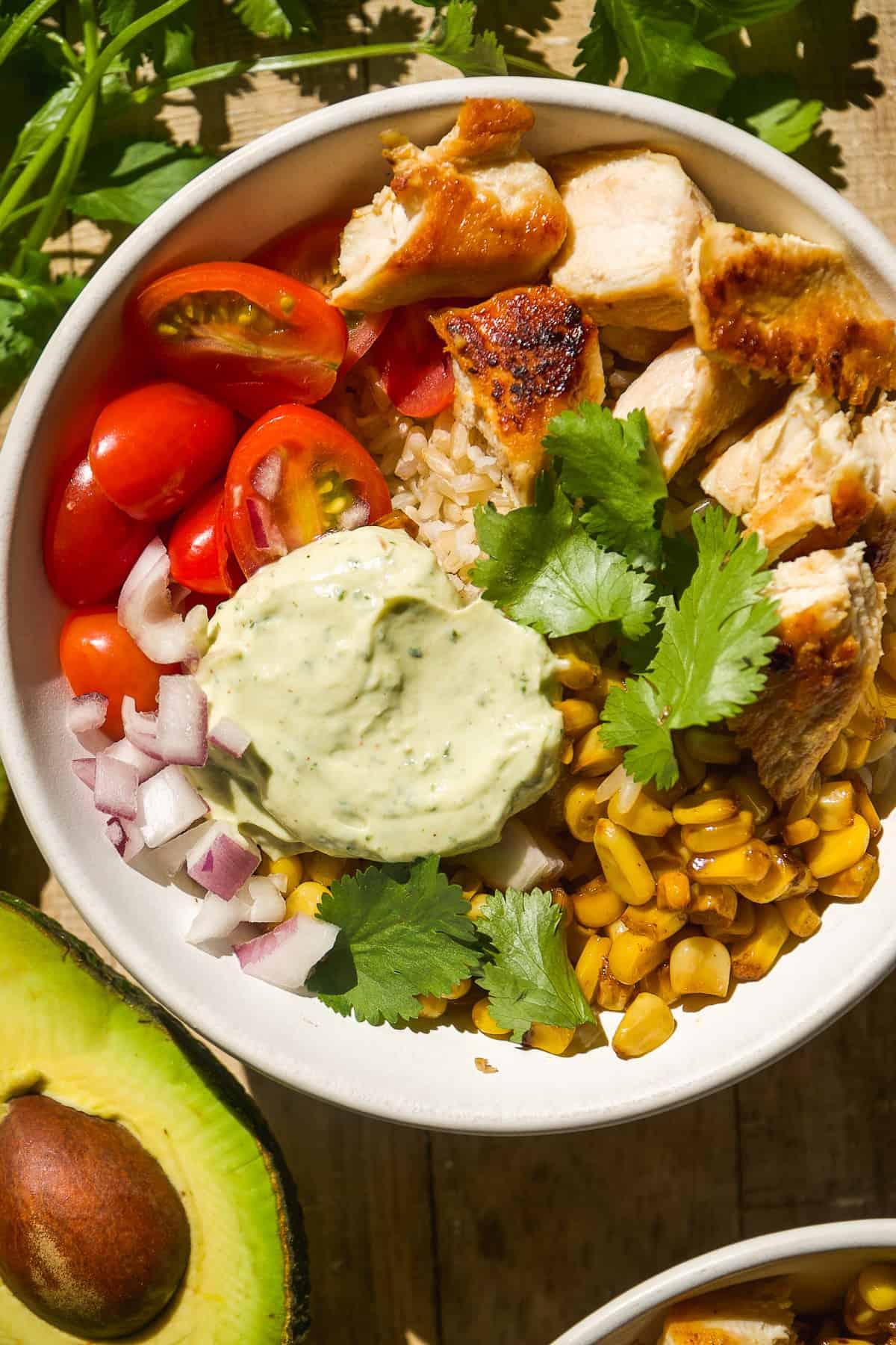 healthy chicken taco bowl with fresh toppings